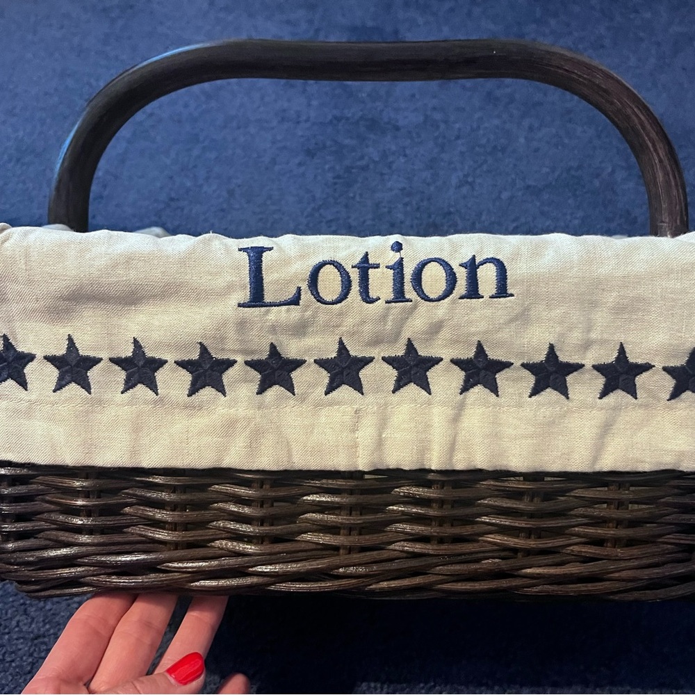 2 Pottery Barn Baskets with embroidered liner.